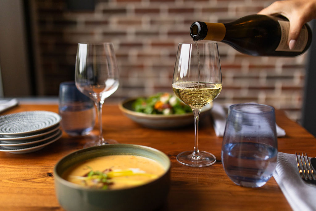 pic of dinner in Back Table at The Woodlands Resort