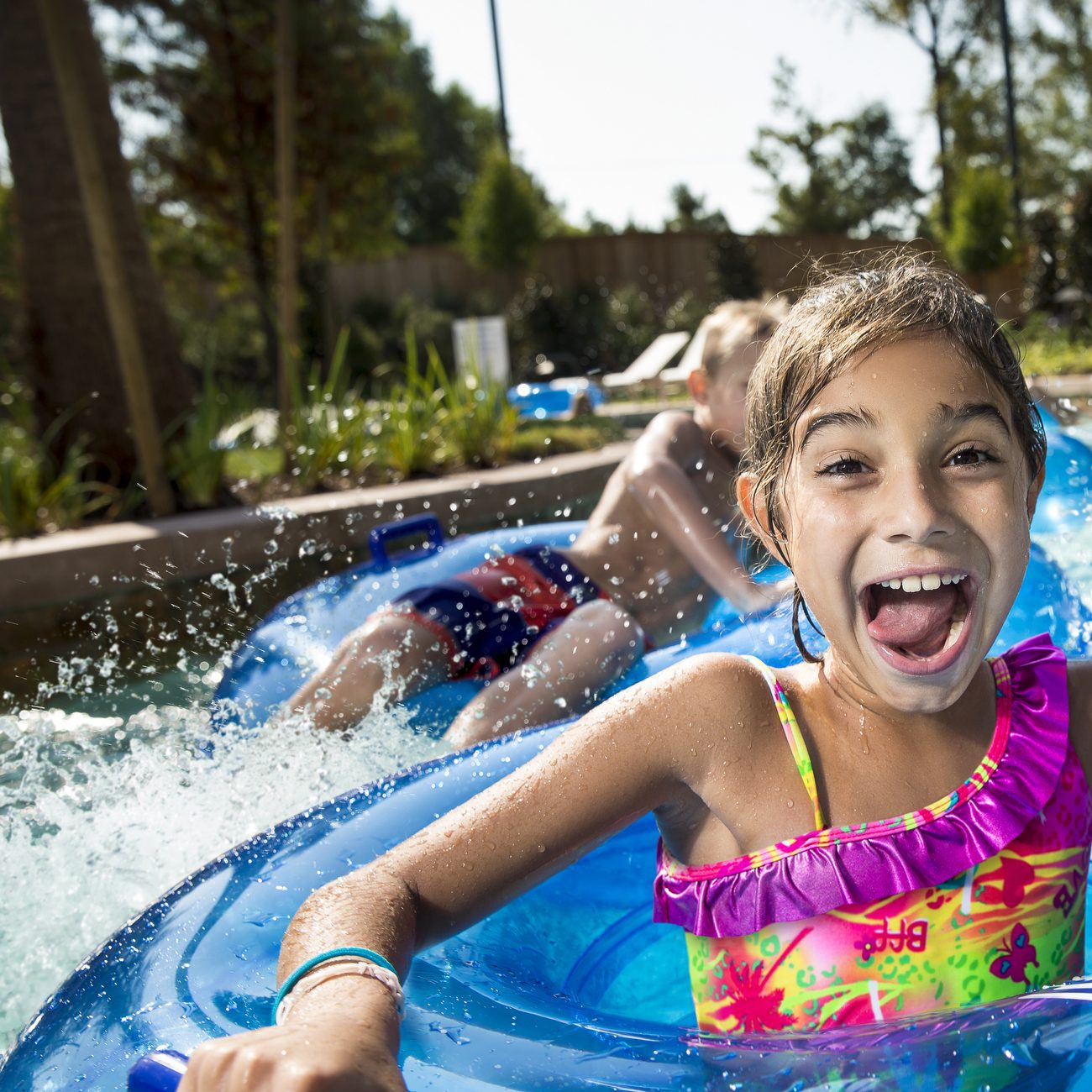 image of girl in tube on the Lazy River at The Woodlands Resort
