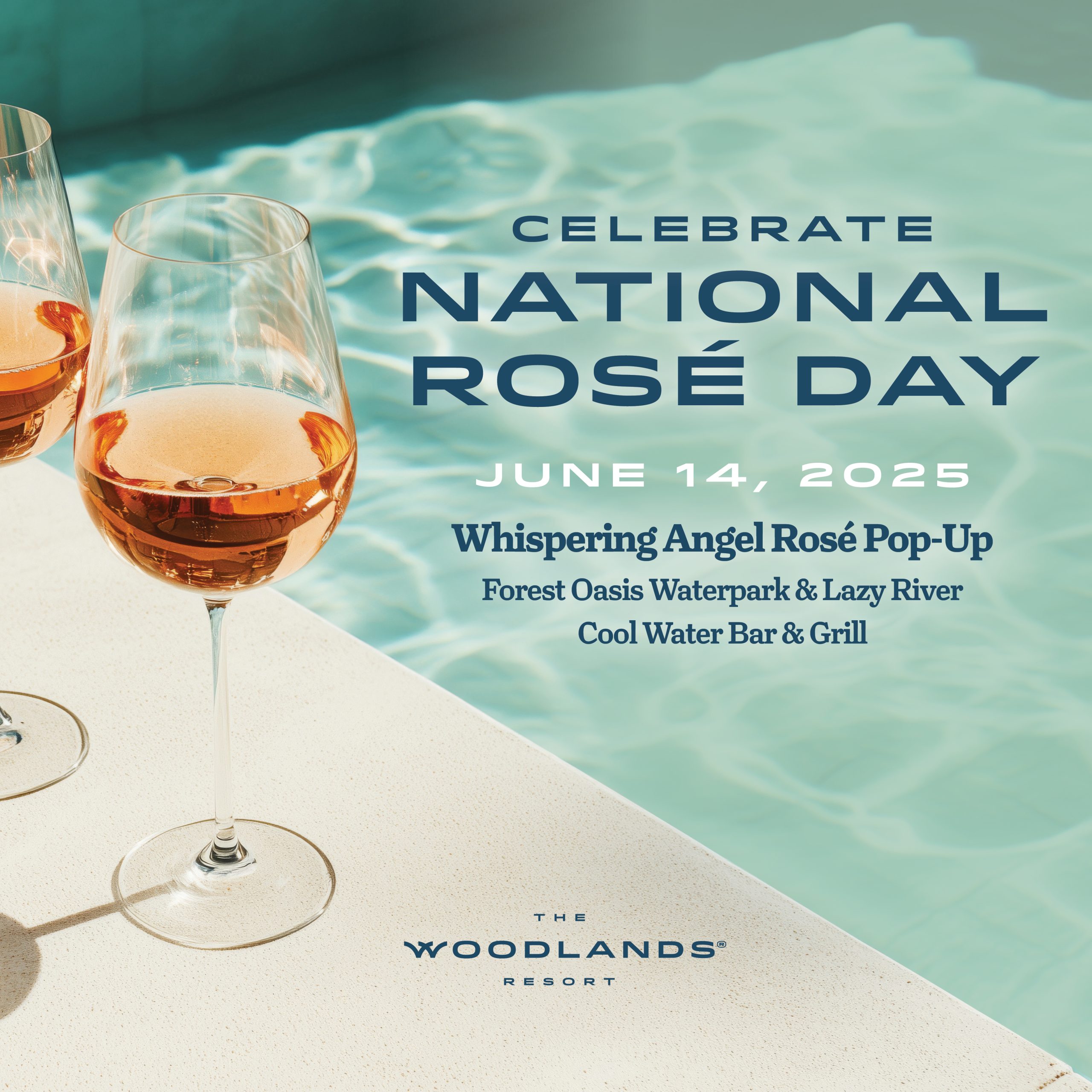 Image of two glasses of wine by the pool